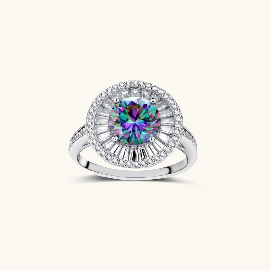 Close-up of sterling silver halo ring with round rainbow moissanite center stone surrounded by baguette-cut stones